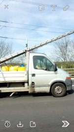 three 8meter ladders on the back of ten ft back transit not even clipped.jpg